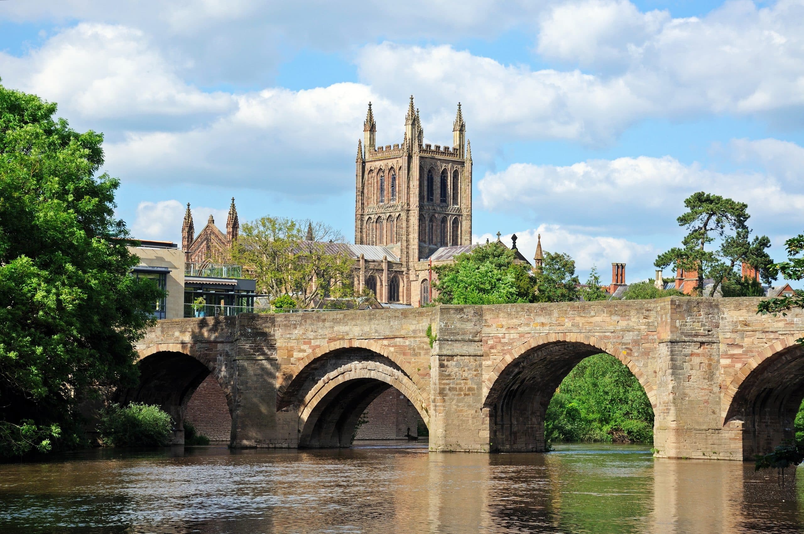 Hereford Cathedral viewed across the River Wye and Old Wye Bridge in Herefordshire