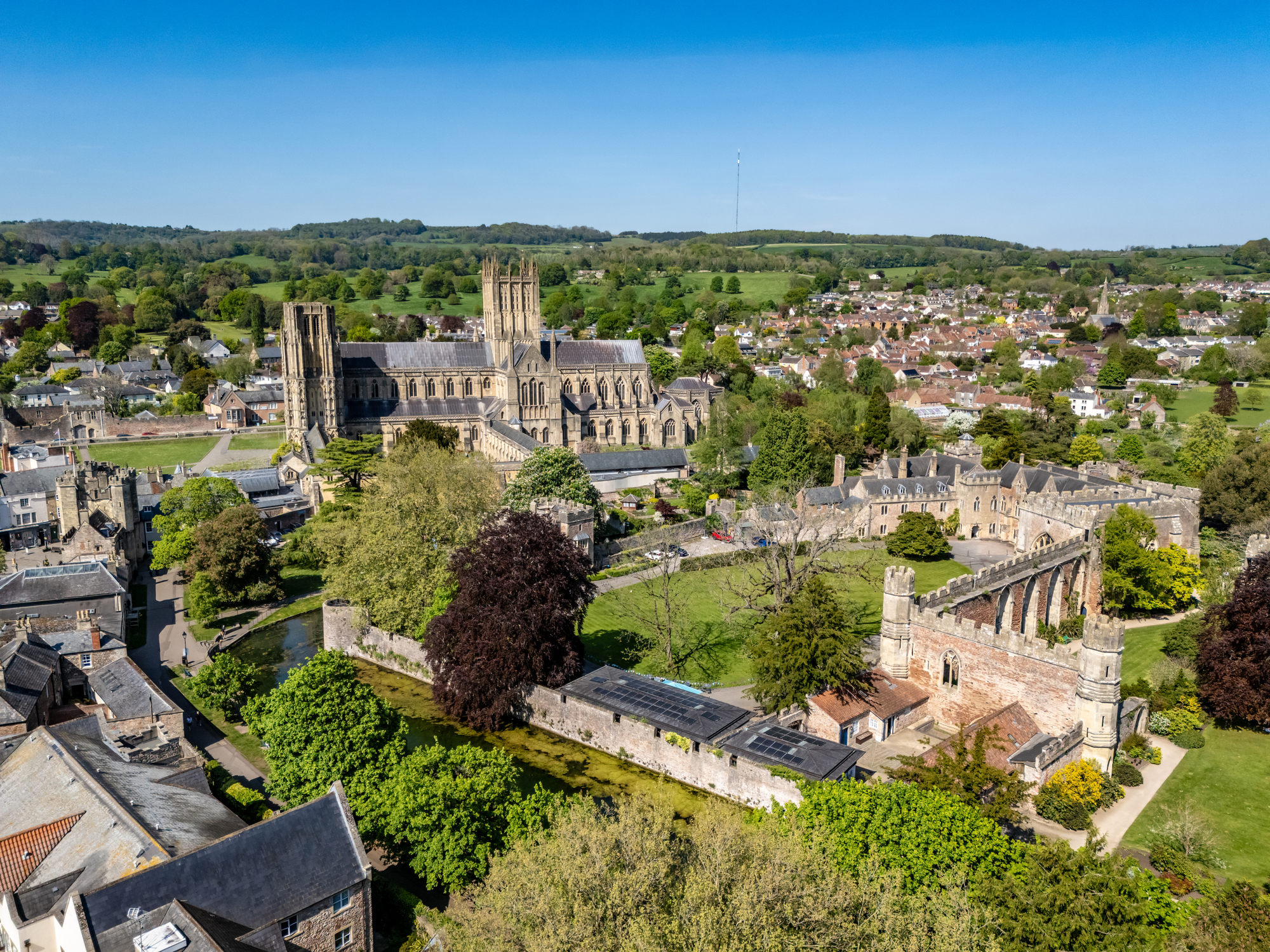 Aerial view of Wells Cathedral, Bishop's Palace and Wells city centre in Somerset