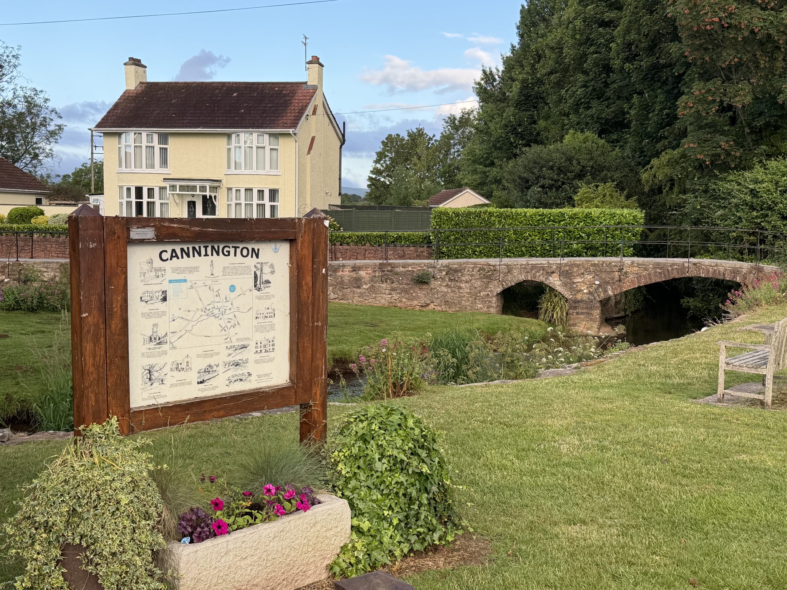 Cannington village sign and historic bridge in Somerset