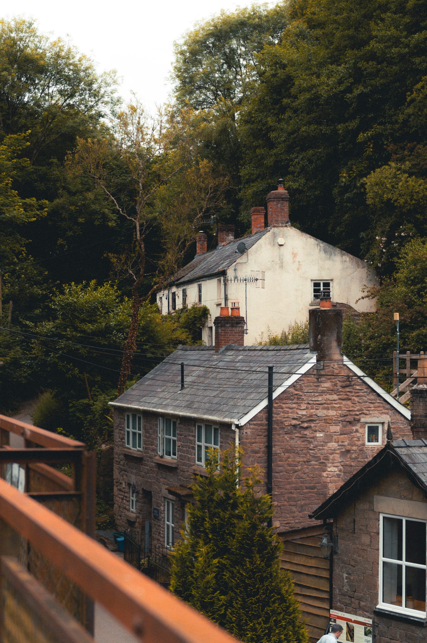 Traditional stone homes surrounded by woodland in Dulverton, Somerset