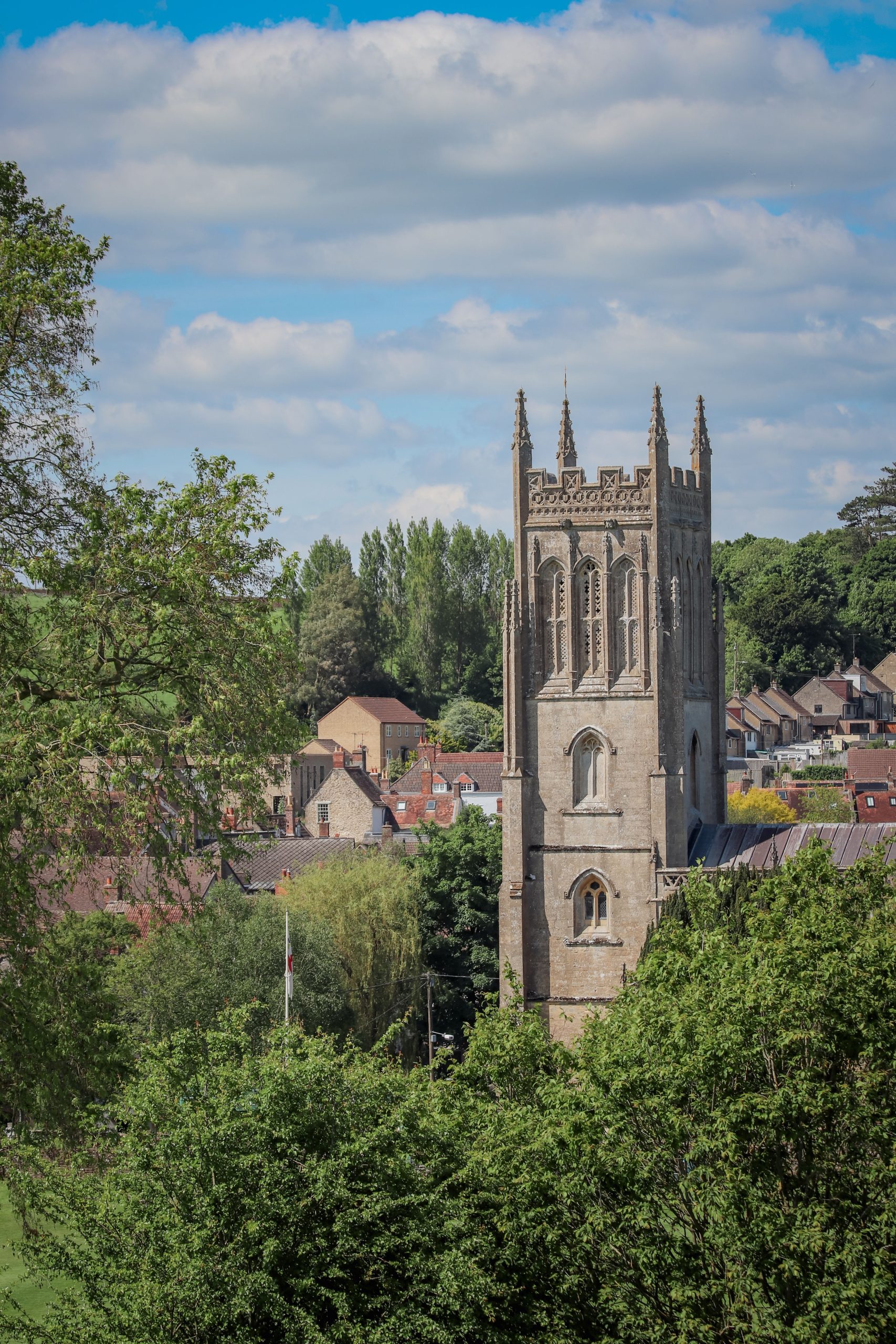 St Michael and All Angels Church overlooking homes in Somerton, Somerset