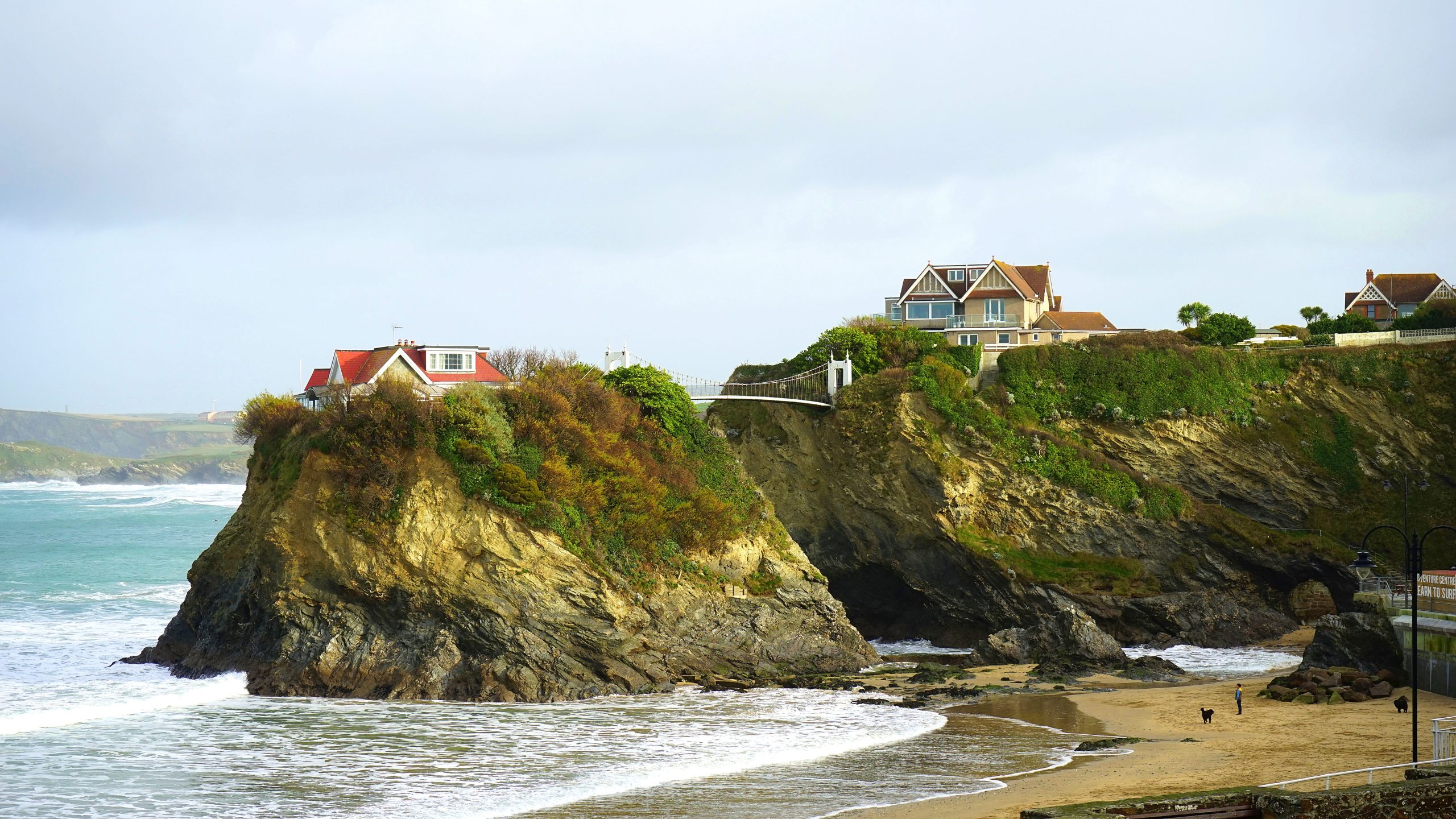 Rocky coastal headland and sandy beach at Bude in Cornwall