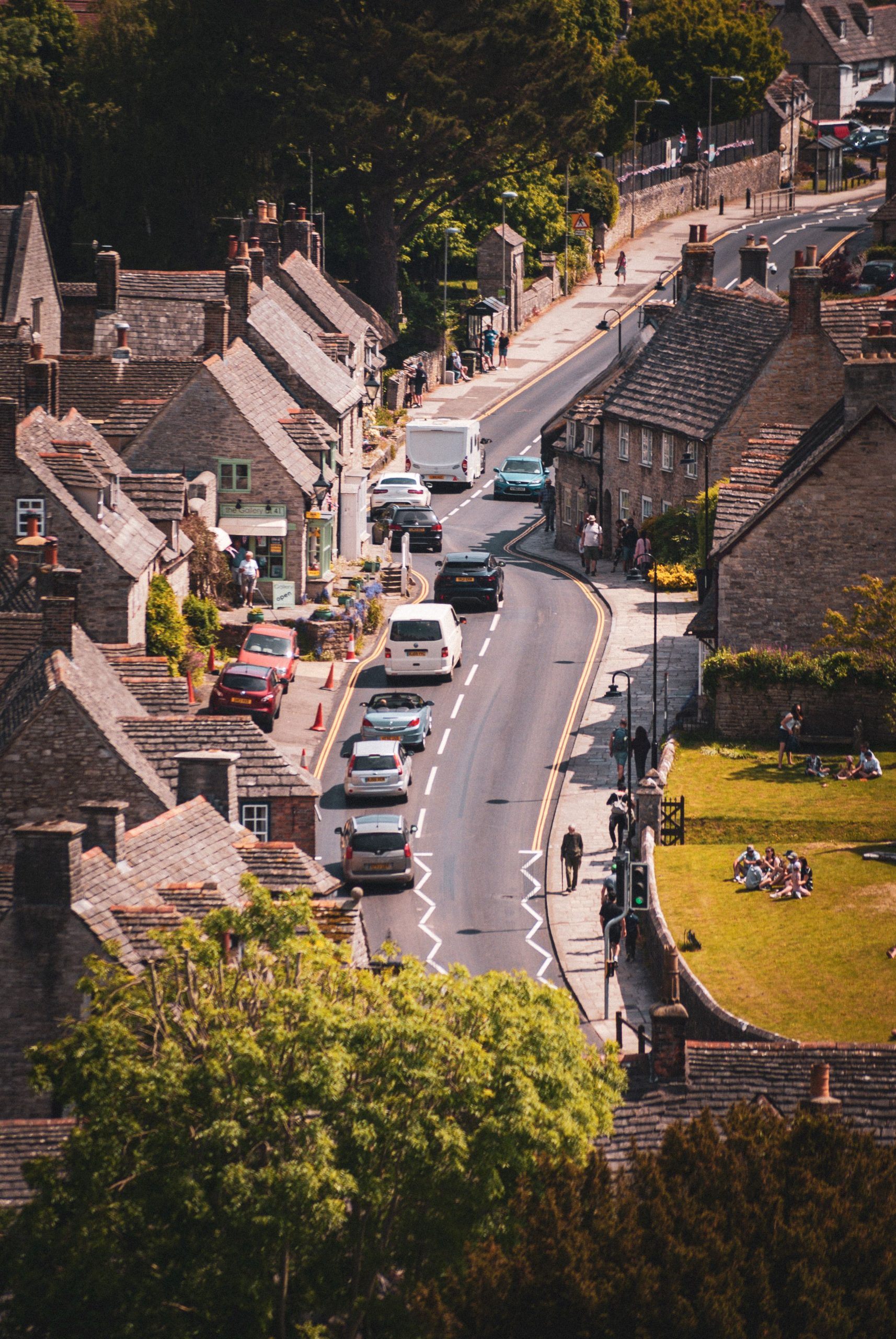 Traditional stone cottages along the main street in Corfe Castle village, Dorset