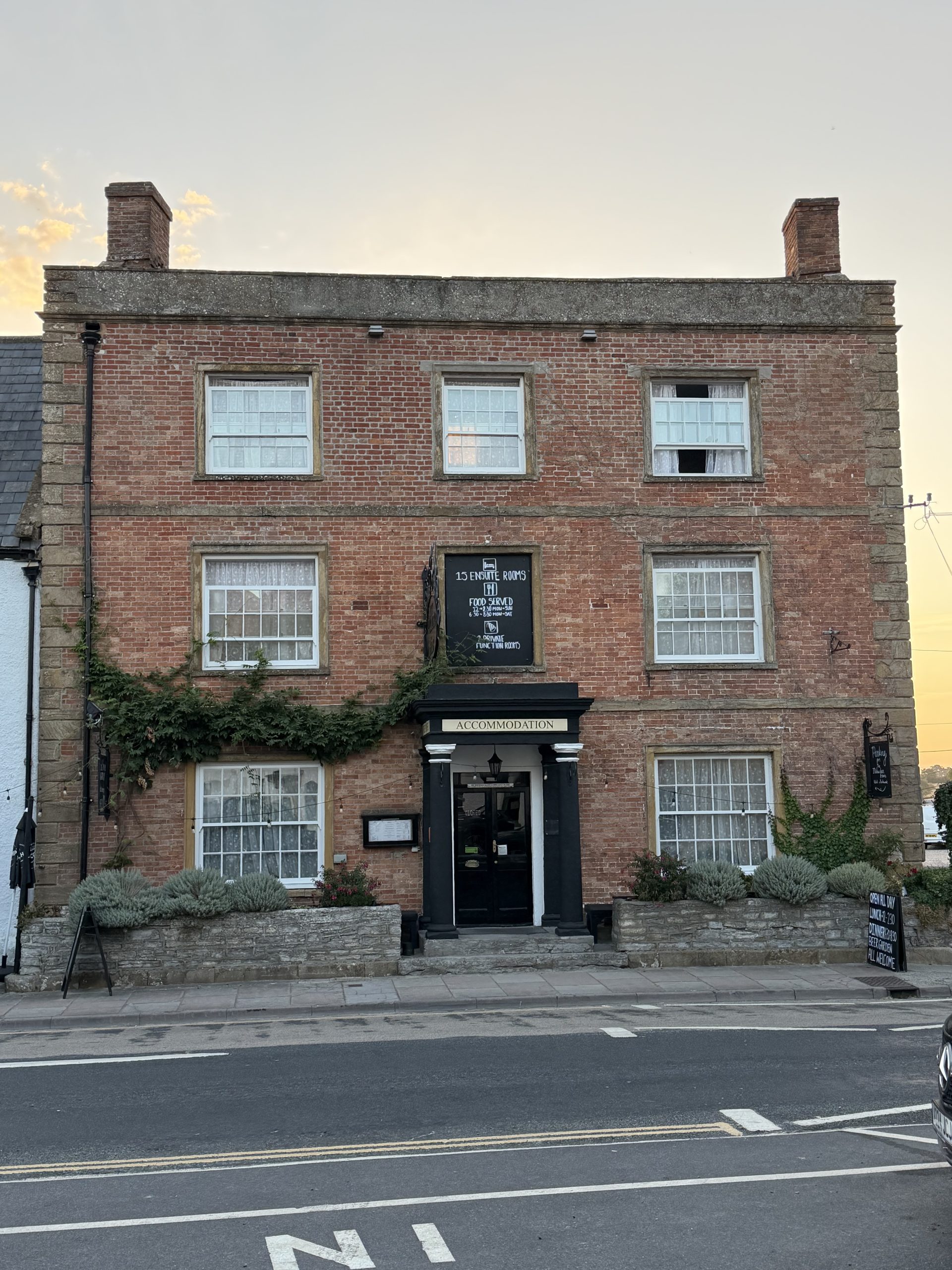 Historic red-brick building in the centre of Ilchester, Somerset