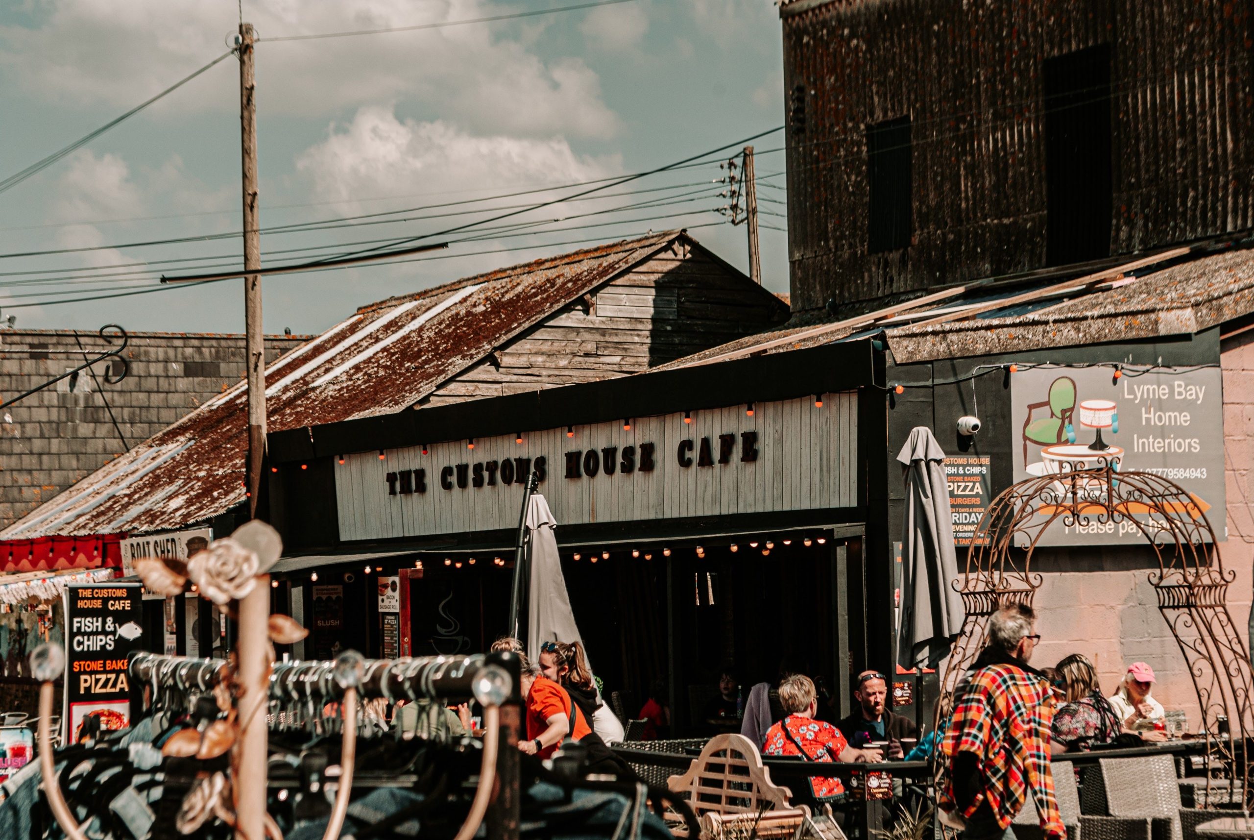 Customs House Café and local businesses near Lyme Regis harbour in Dorset