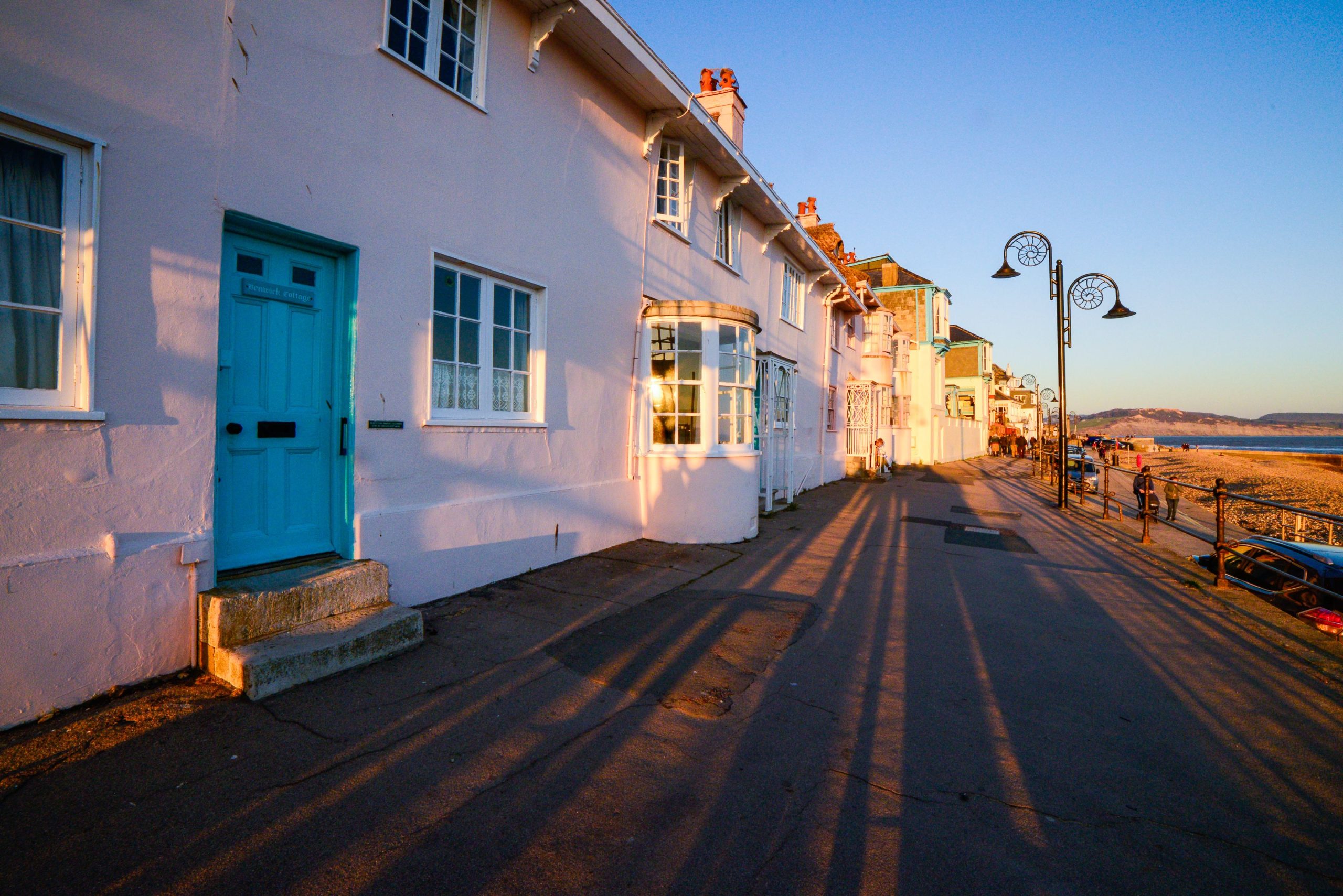 Marine Parade and seafront houses beside the beach in Lyme Regis, Dorset