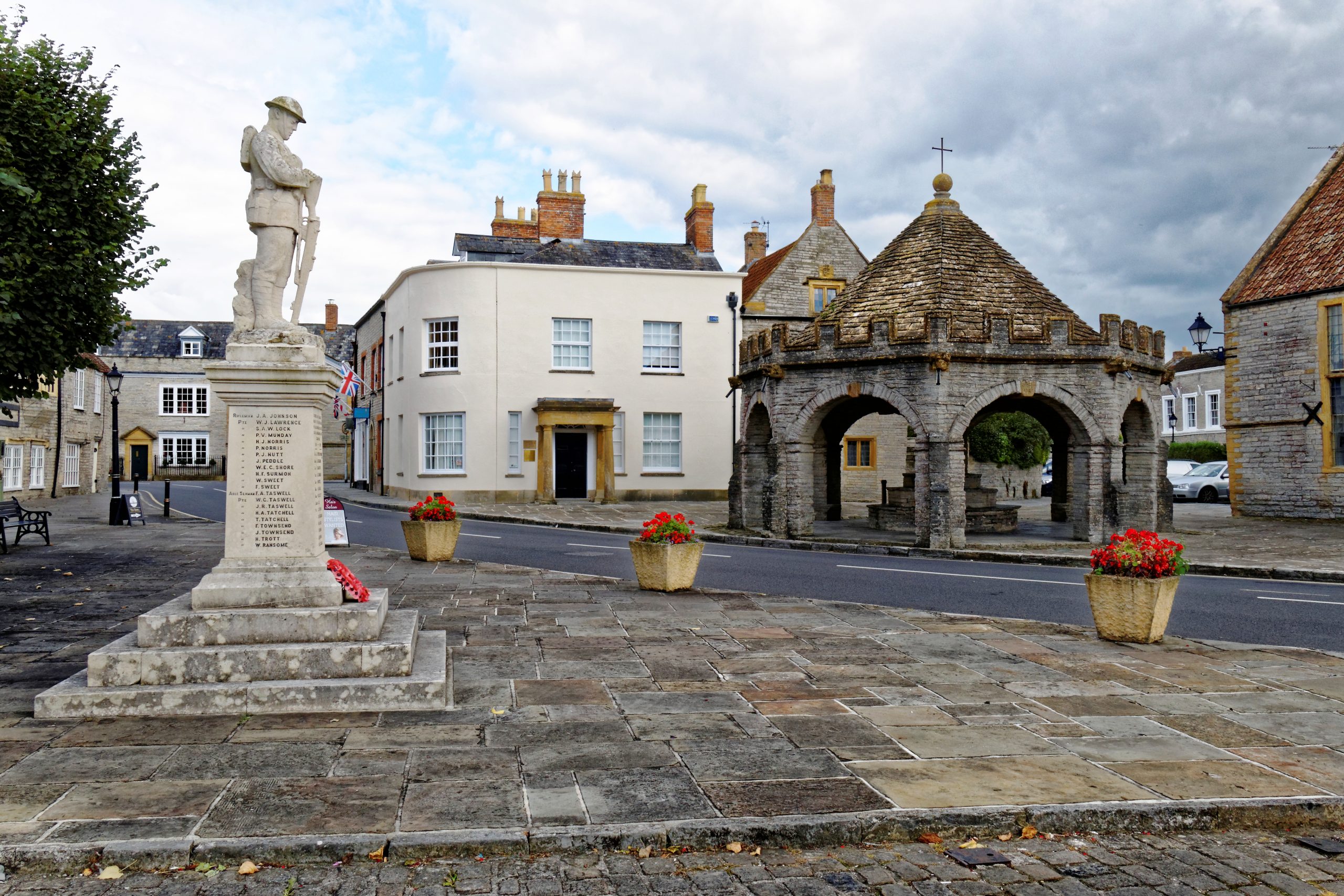 Somerton Market Place with the historic Buttercross and war memorial in Somerset