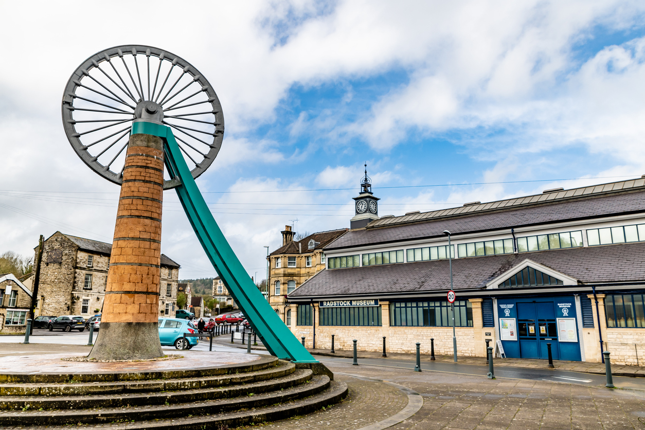 Mining wheel monument and Radstock Museum in Radstock, Somerset