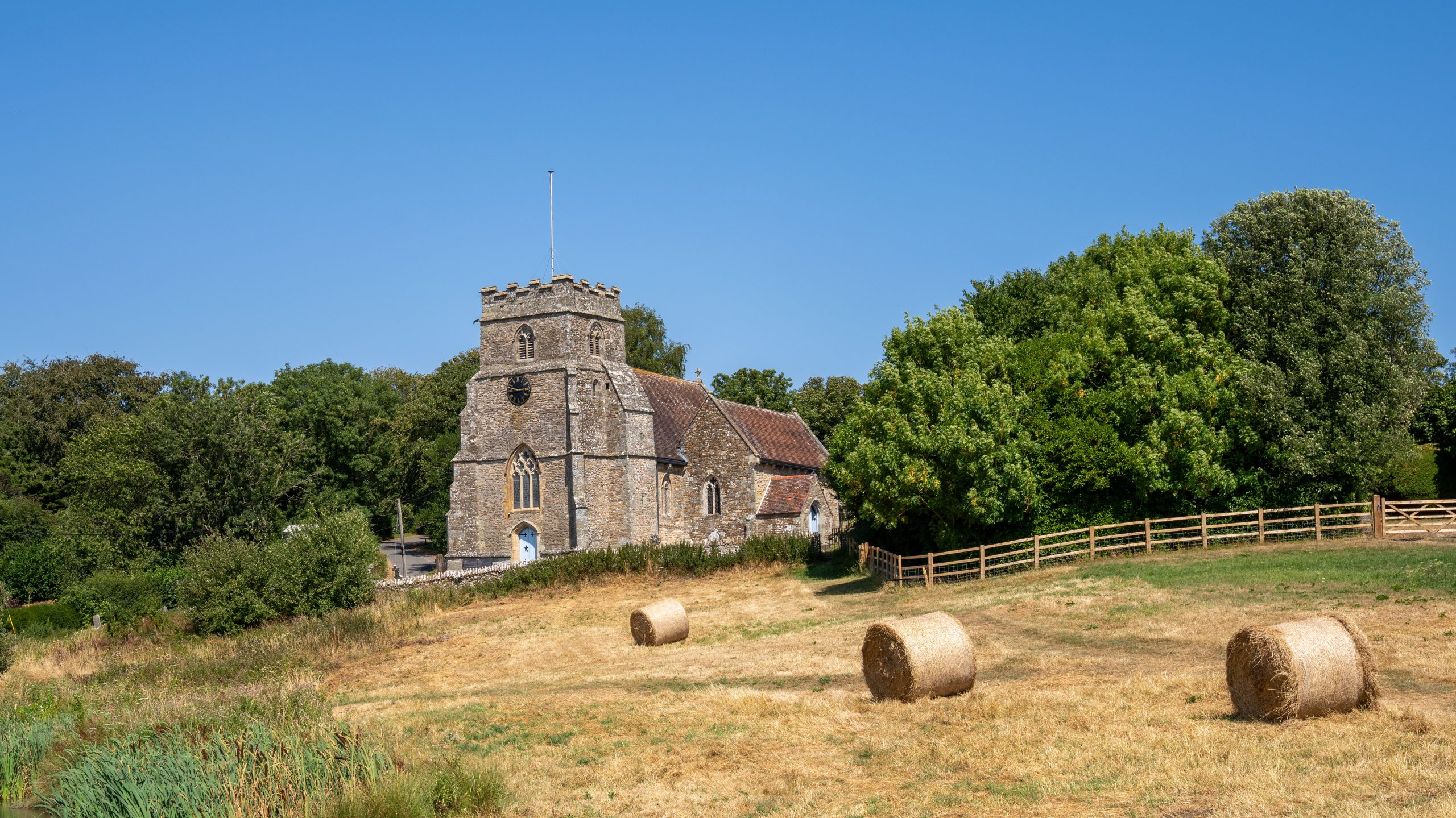 Historic church beside fields in the countryside near Sturminster Newton, Dorset