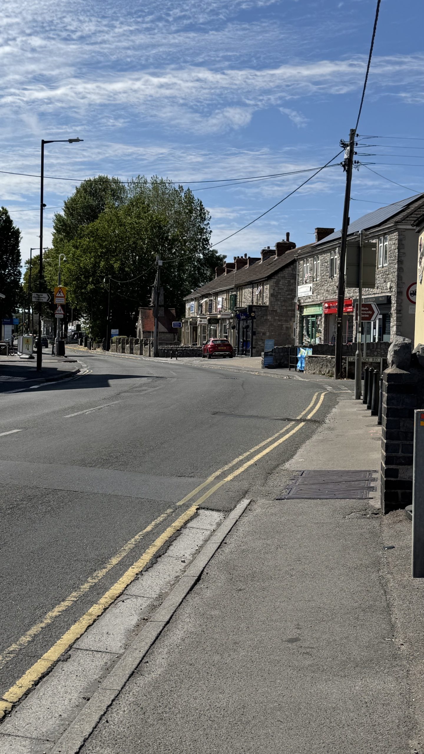Local shops and businesses along the High Street in Worle, North Somerset