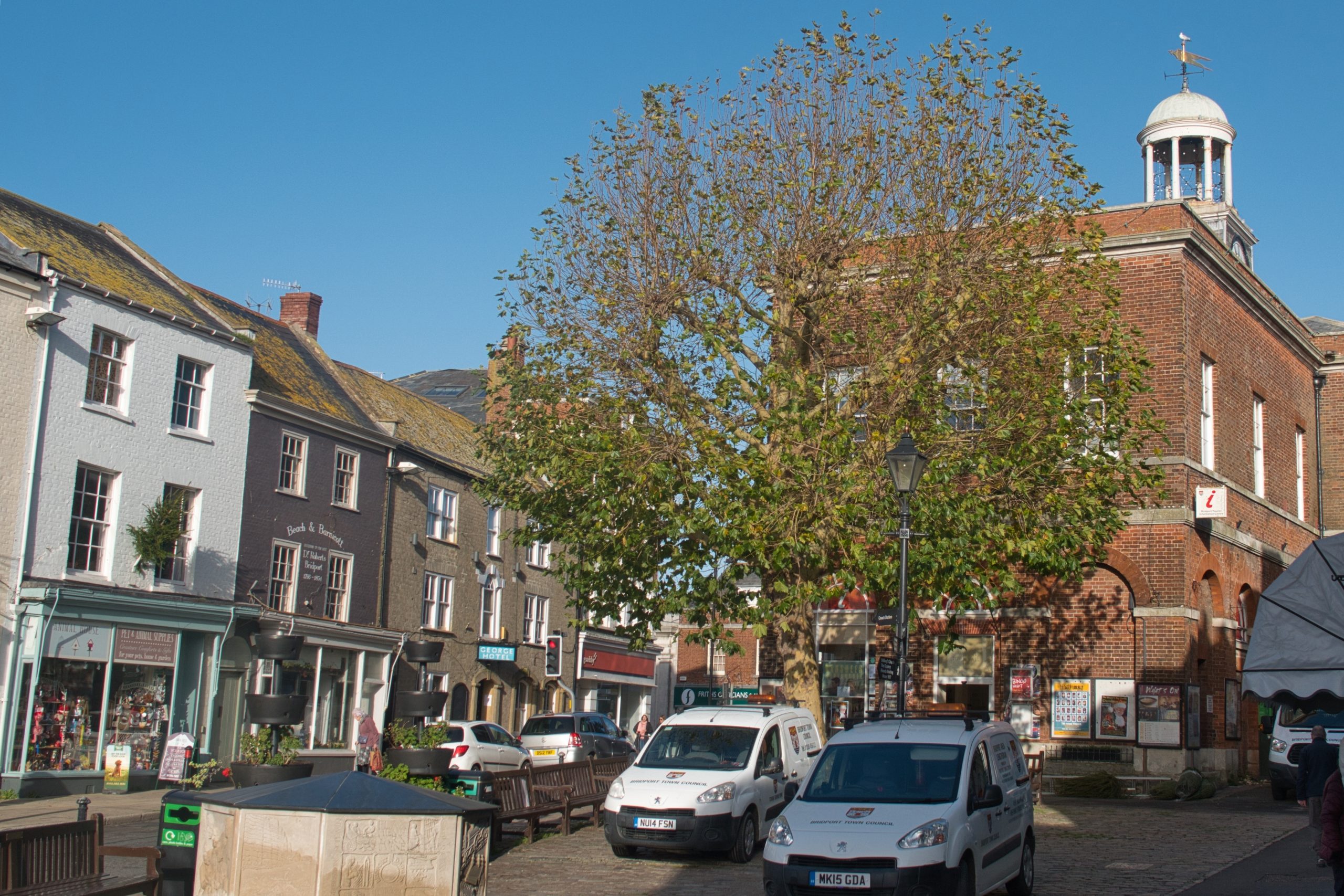 Bridport Town Hall and shops in Bridport town centre, Dorset