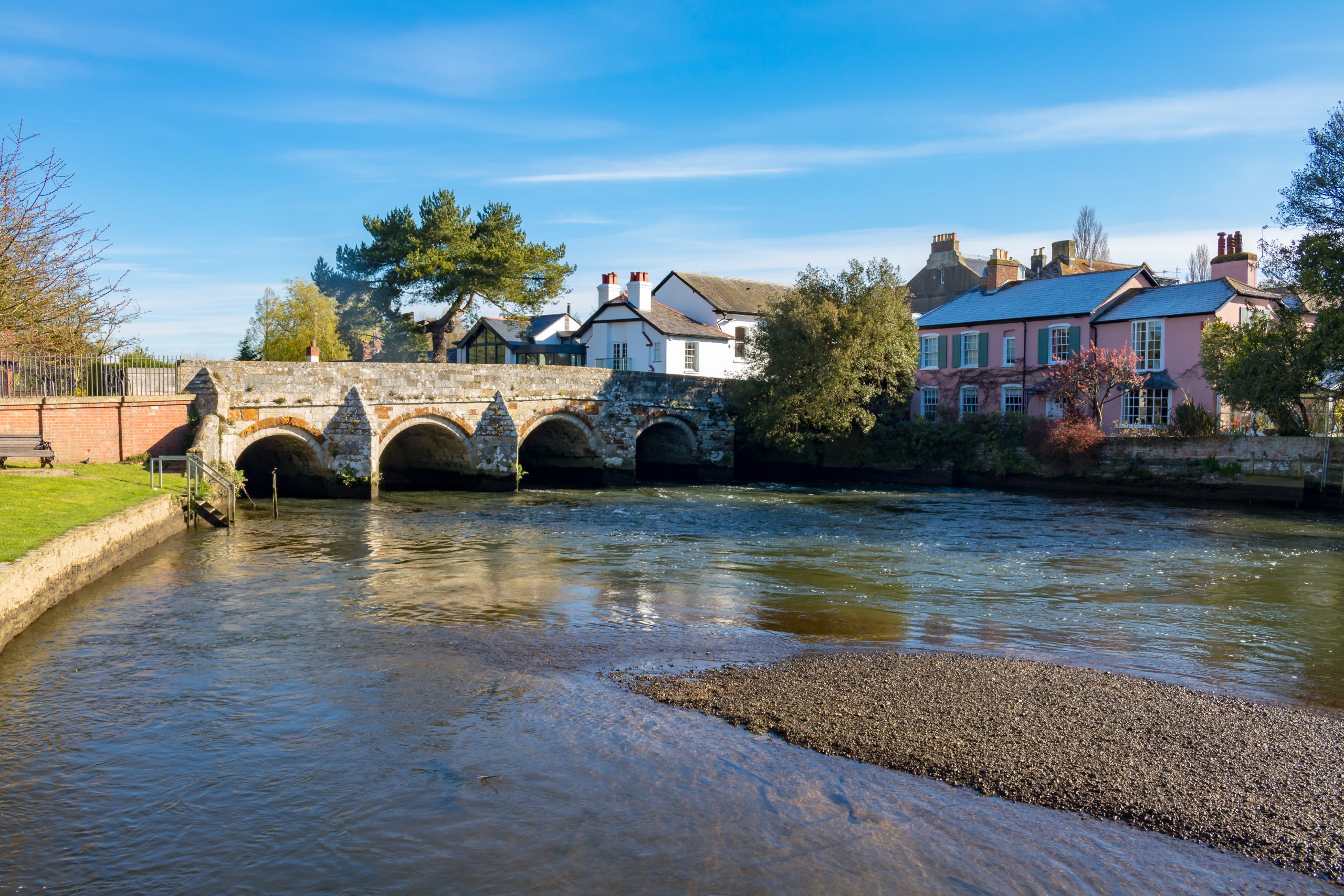 Historic stone bridge over the River Avon in Christchurch, Dorset