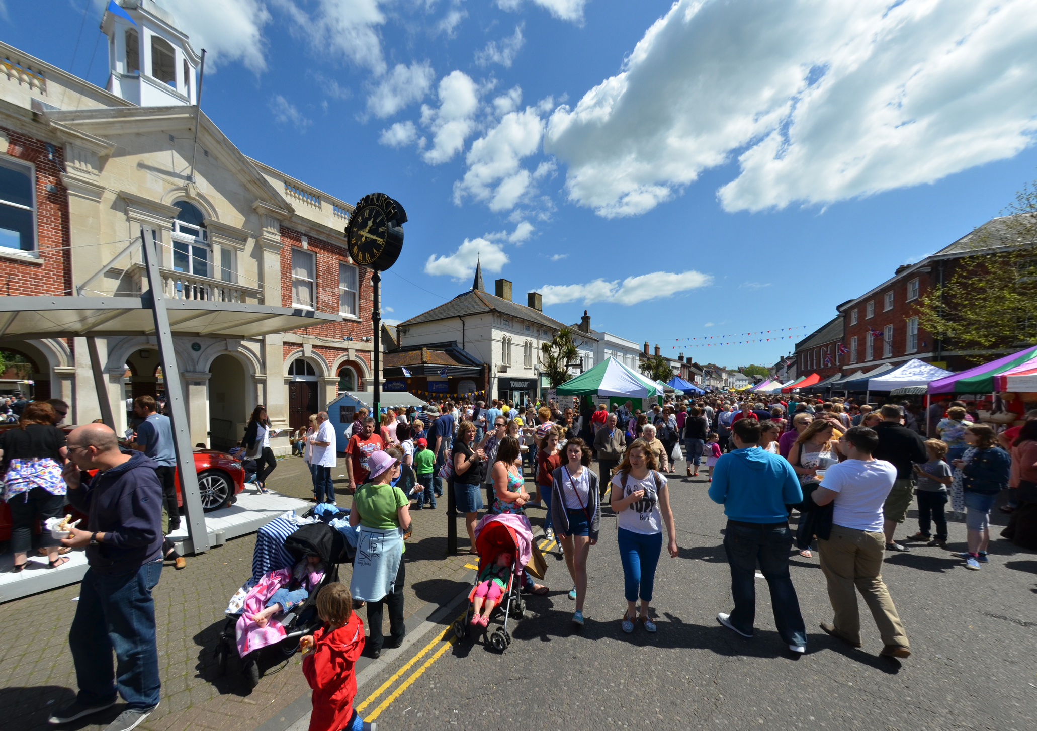 Busy community event in Christchurch town centre, Dorset