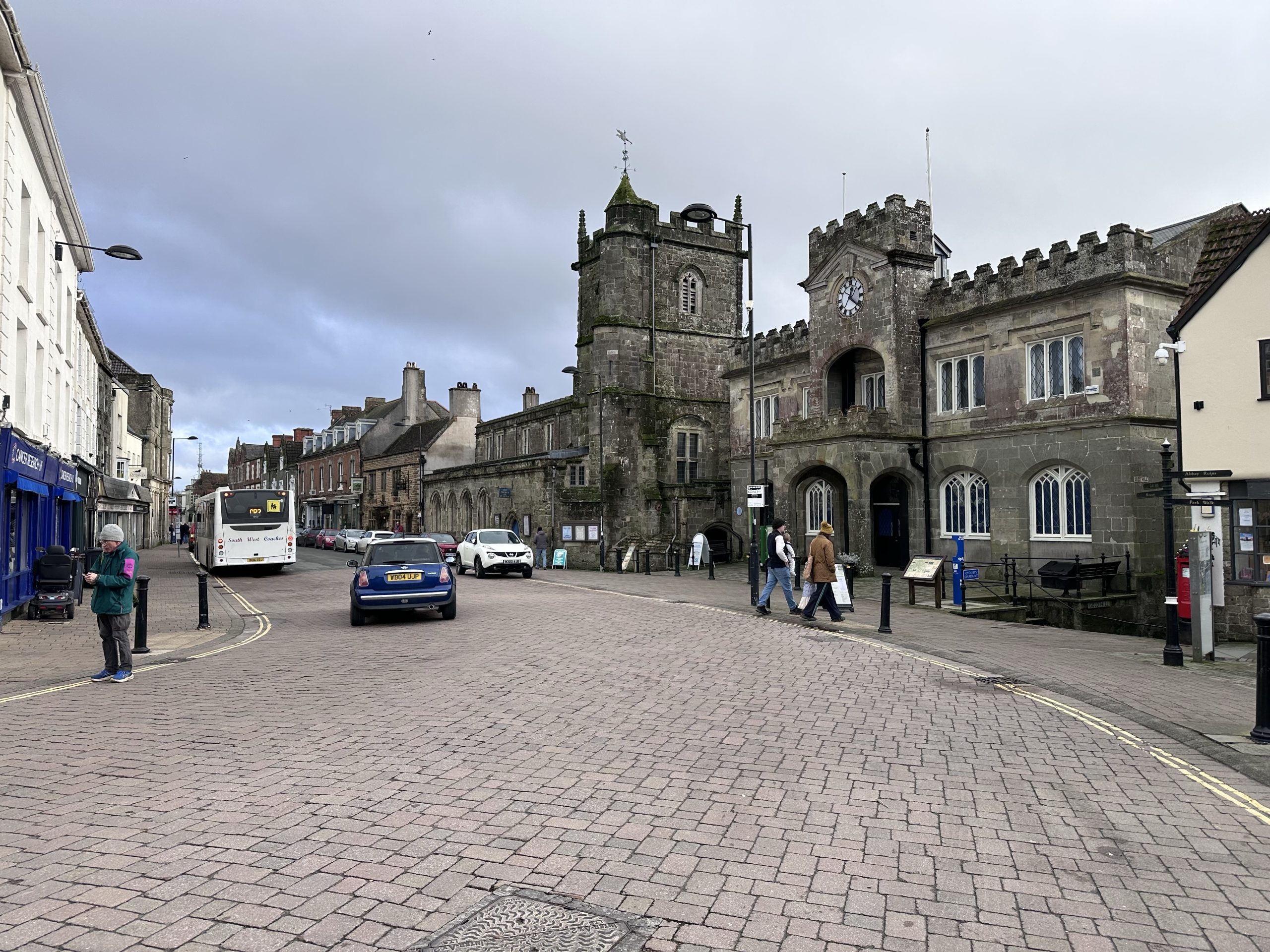Shaftesbury town centre with historic buildings, shops and local bus services in Dorset