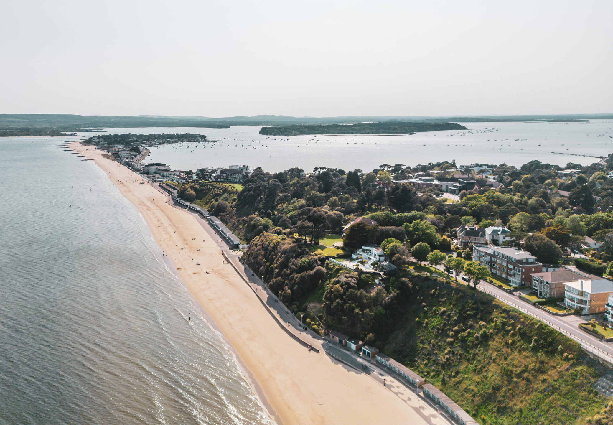 Aerial view from Canford Cliffs towards Sandbanks and Poole Harbour in Dorset