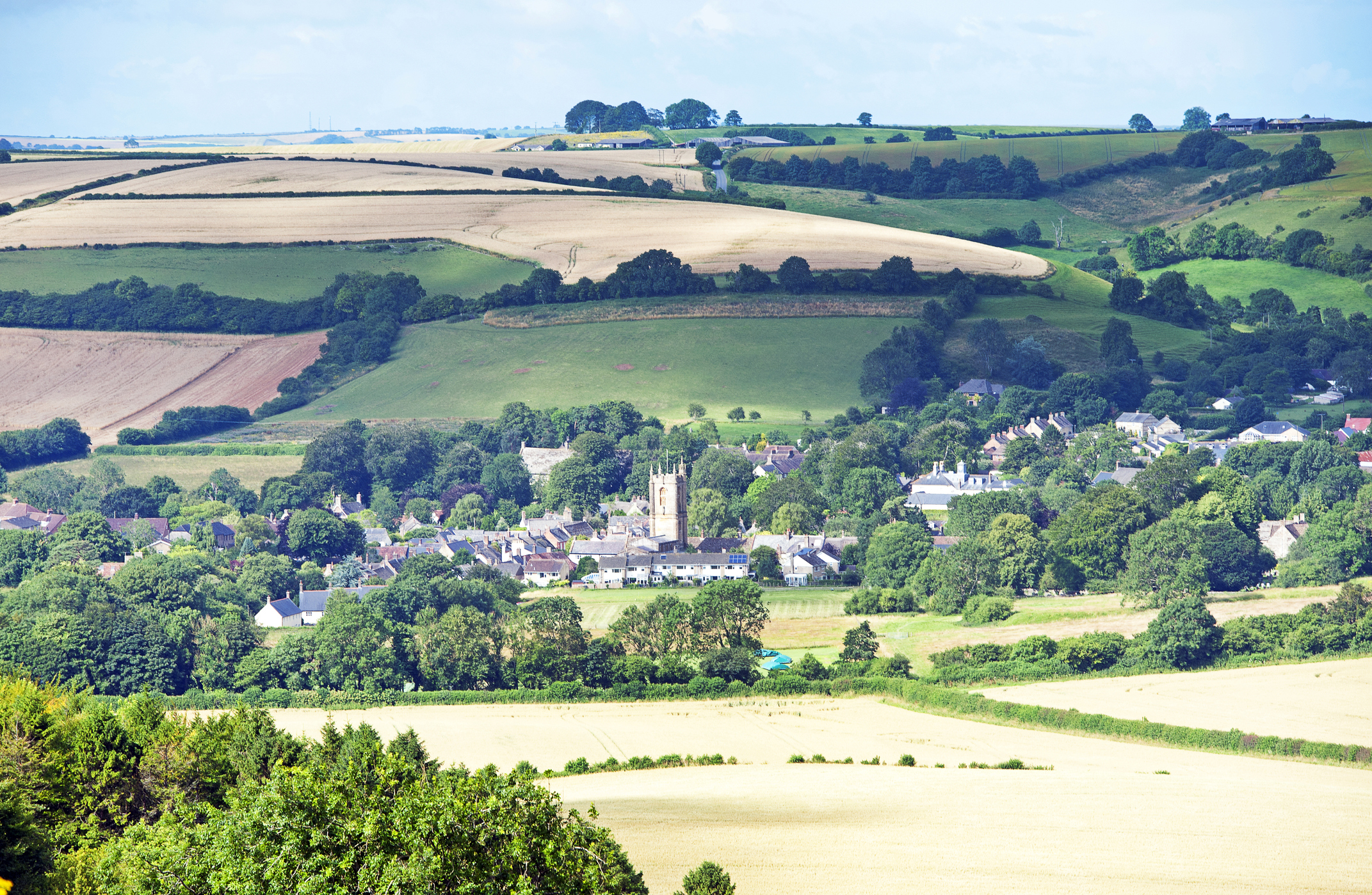 Cerne Abbas village surrounded by rolling Dorset countryside