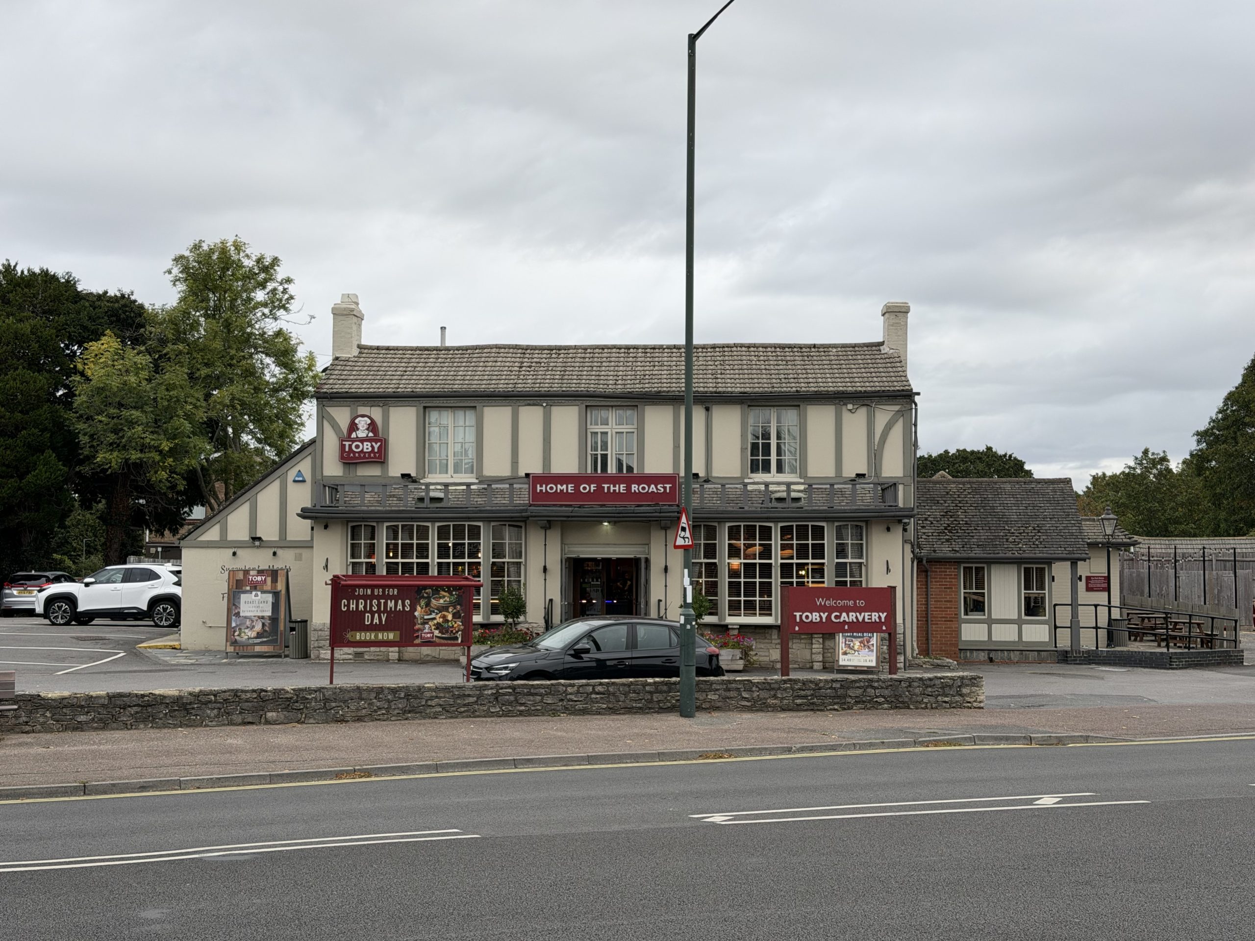 Toby Carvery restaurant in Kinson, Bournemouth, with its traditional building and roadside entrance.
