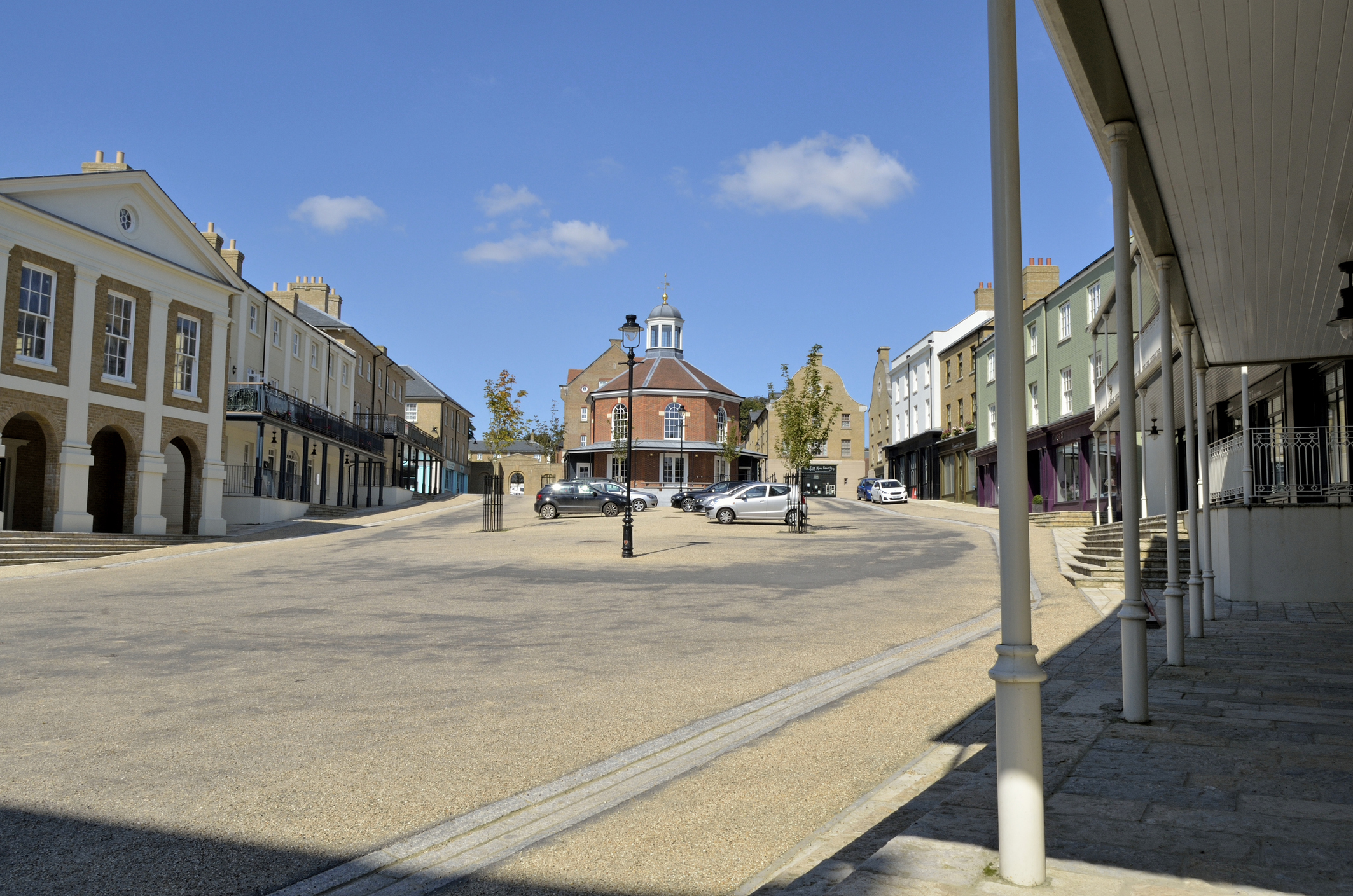 Traditional-style buildings around a public square in Poundbury, Dorset