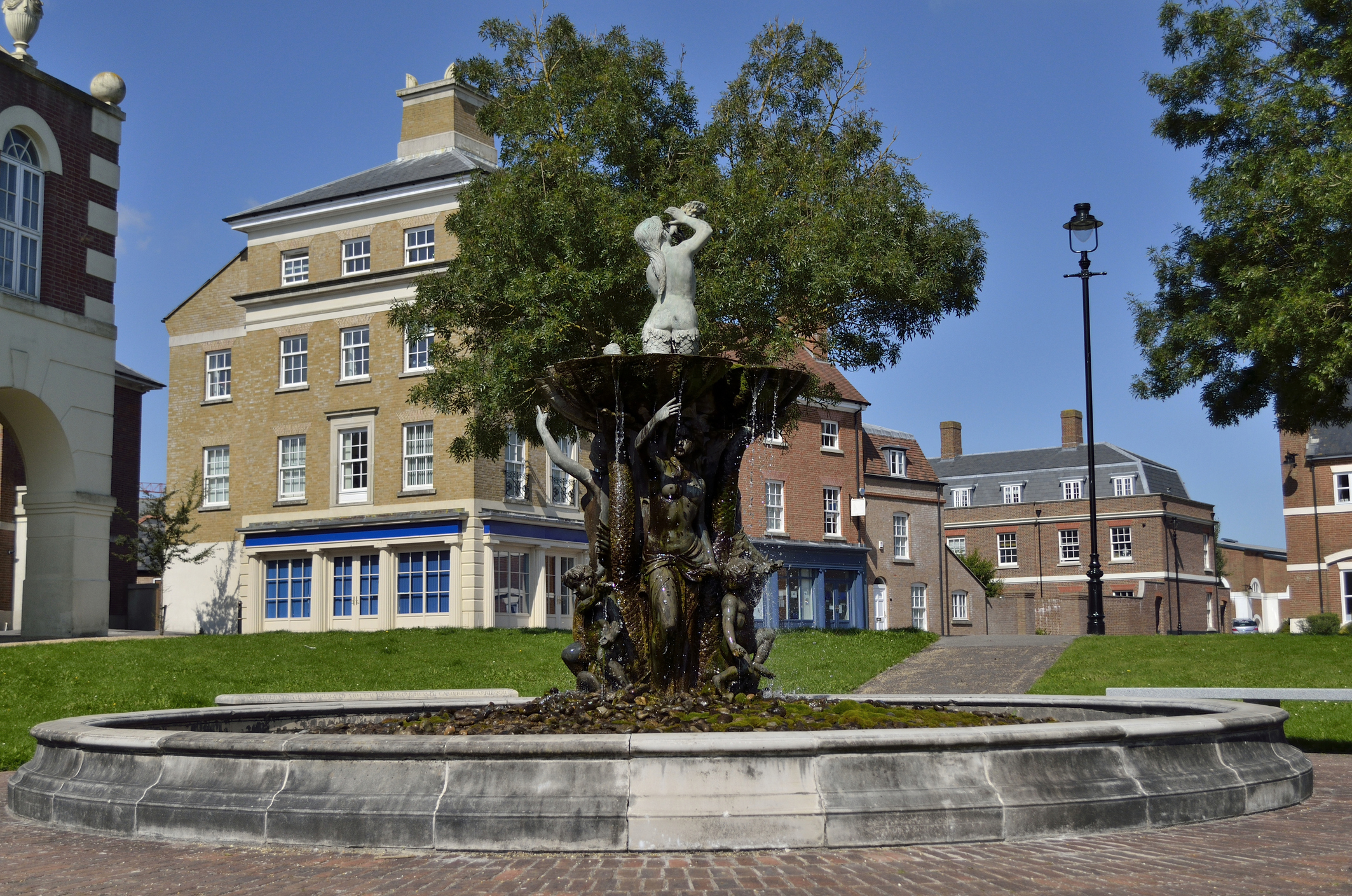 Fountain and traditional-style architecture in Poundbury, Dorset