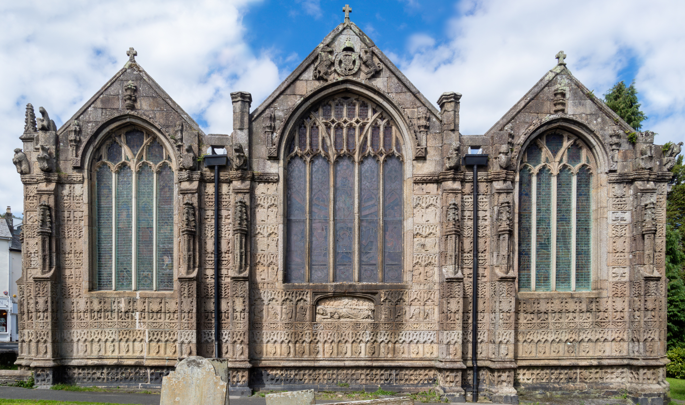 Ornate stone carvings and Gothic windows of St Mary Magdalene Church in Launceston Cornwall