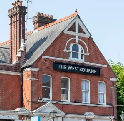 The Westbourne pub with traditional red-brick architecture in Westbourne, Bournemouth, Dorset.