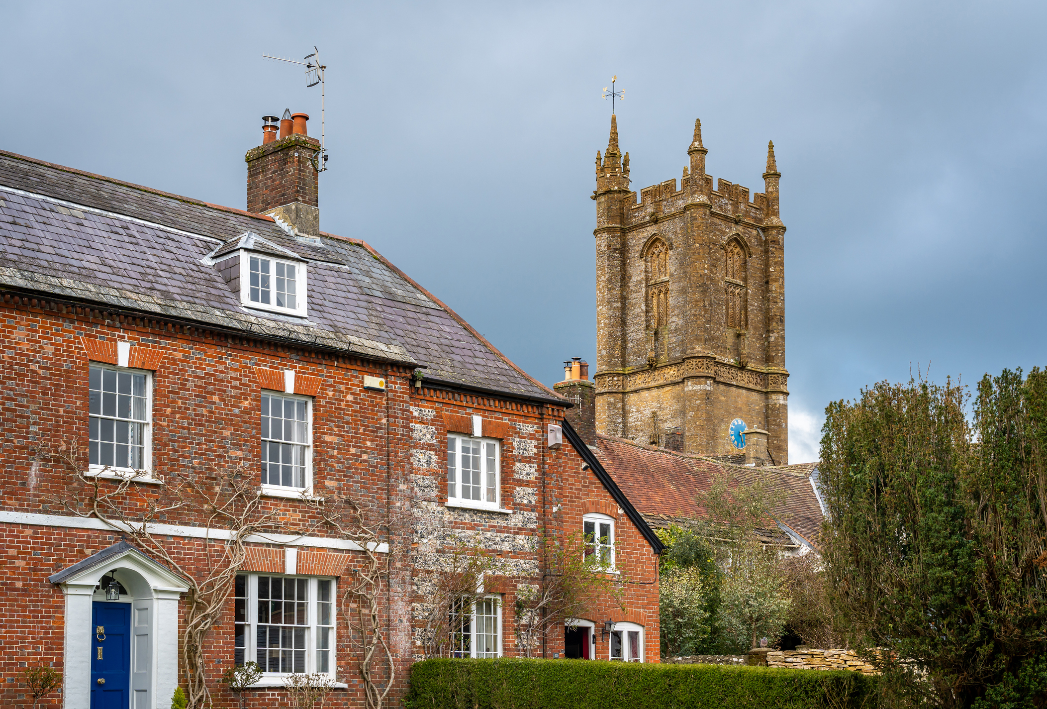 St Mary's Church and traditional houses in Cerne Abbas, Dorset
